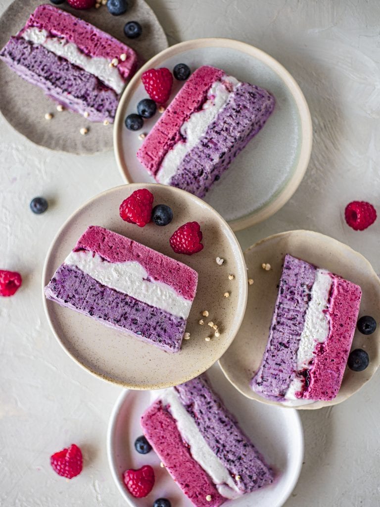 Flatlay of slices of berry ice cream cake